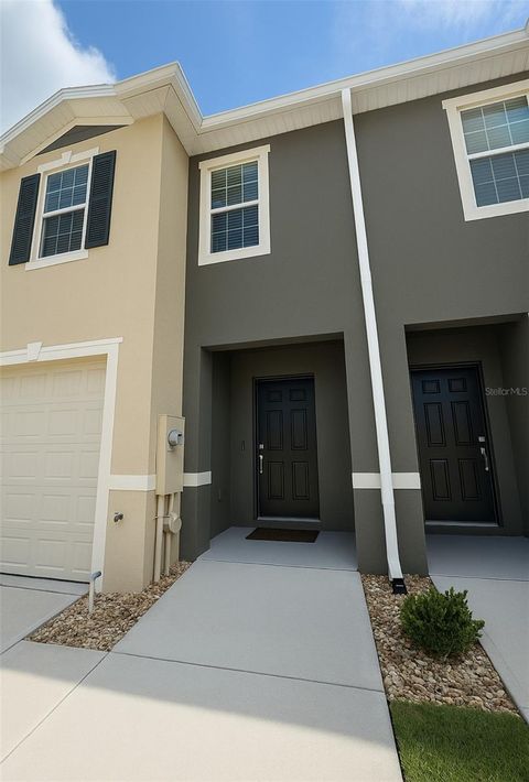 Photo of 1045 Blue Jay Drive, Davenport, FL 33837 (MLS # TB8421521)