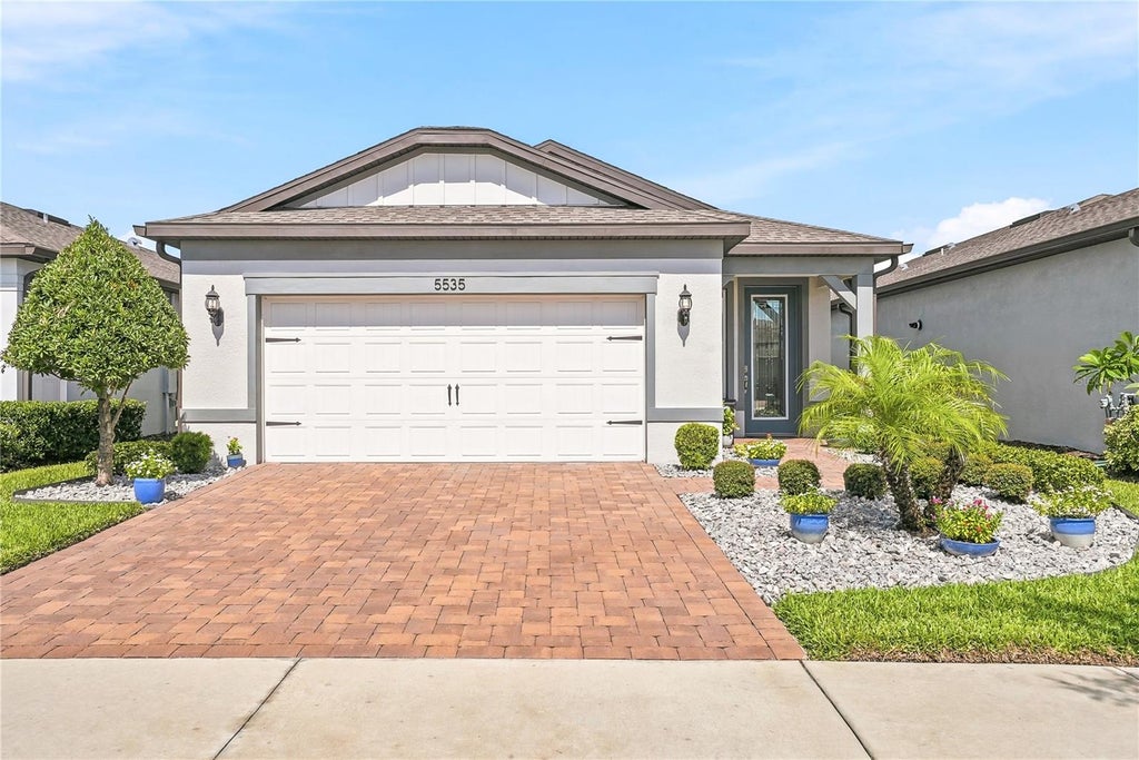 Photo of 5535 Blue Crush Bend, Land O Lakes, FL 34638 (MLS # TB8548411)