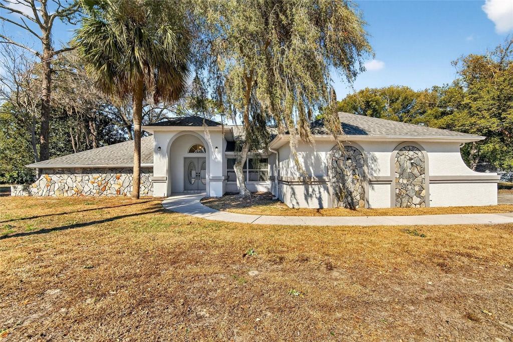 Photo of 15047 Woodbury Road, Brooksville, FL 34604 (MLS # TB8473006)