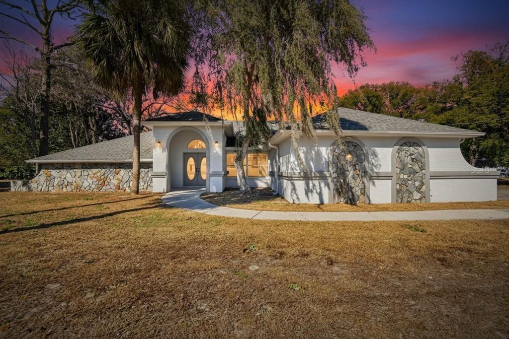 Photo of 15047 Woodbury Road, Brooksville, FL 34604 (MLS # TB8473006)