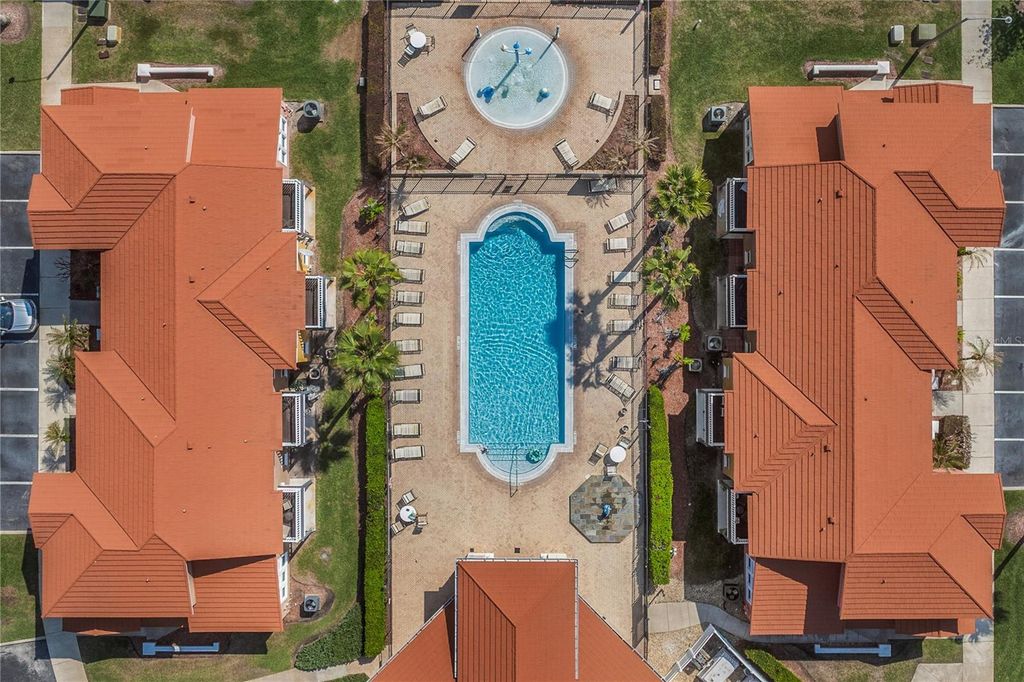 Photo of 1045 Lake Berkley Drive E, Kissimmee, FL 34746 (MLS # O6390674)