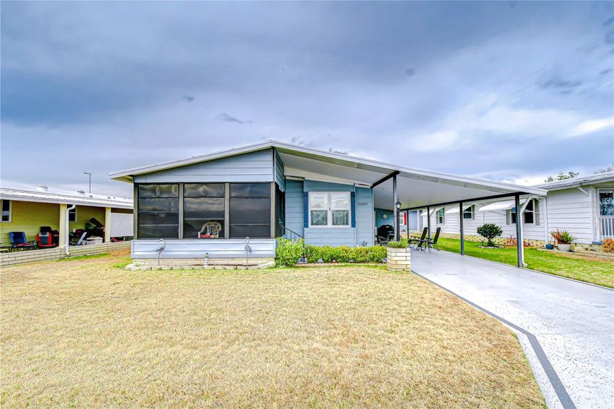 f you are looking for convenience without sacrificing comfort, this is the one.  Perfectly situated for easy access to Tampa, Lakeland, Plant City and the interstate. This 2 bedroom, 2 bath mobile home backs up directly to the clubhouse and amenities. Giving you privacy in the back with no close neighbors behind you and quick access to everything the community offers. Enjoy your mornings or evenings on the front enclosed porch. The perfect spot to relax and take in the surroundings. Inside you will find generously sized rooms throughout.  The open floor plan connects the living room, dining area and kitchen creating an inviting space for entertaining or everyday living.  The
home comes fully furnished making it move-in ready. The kitchen is designed with function in mind featuring a pantry and plenty of open space. The dining area includes a built-in cabinet for more storage.  The hall bath offers a tub and an additional storage closet.  The oversized primary bedroom features a walk-in closet and ceiling fan. The thoughtfully designed ensuite has a separate vanity and storage area, while the toilet and walk-in shower are privately set in their own space.  The secondary bedroom is also larger and includes a walk-in closet. Outside you will find the shed with a laundry area and space for your workshop.  This is located at the rear of the carport.  This very active community offers a pool, spa, large clubhouse, and tennis court. Everything you need to enjoy a vibrant social lifestyle. If you want location, space and amenities all in one package this home checks every box. Call now to make an appointment to view your next home and welcoming community.