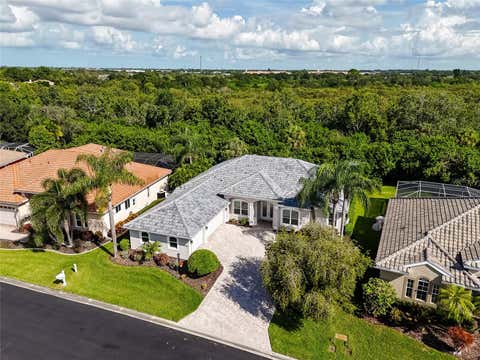 Photo of 4953 Gardiners Bay Circle, Sarasota, FL 34238 (MLS # A4703529)