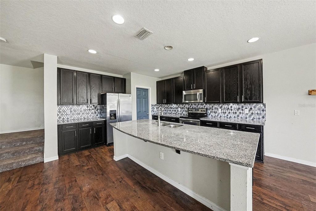 Photo of 10233 Newminster Loop, Ruskin, FL 33573 (MLS # TB8458564)