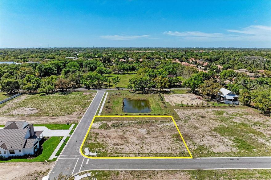 THE LAST REMAINING OPPORTUNITY TO BUILD YOUR SARASOTA LEGACY AT PALADIN ESTATES! Lot 11 represents the final publicly available homesite in this exclusive enclave, offering a premier corner-lot position with a sprawling 20,648.64 square foot canvas for your custom estate. This exceptional homesite features a desirable East-facing front exposure and backs up to a beautifully landscaped community retention pond, ensuring a private and serene backyard setting. This boat and RV friendly community is designed for the Florida lifestyle, providing the rare opportunity to build a detached toy garage or barn alongside your residence, provided all recreational vehicles are stored within a structure. While the generous setback boundaries provide an expansive building envelope, the .35 lot coverage allowance permits a substantial building footprint of up to 7,227 square feet, easily accommodating a grand residence of at least 2,500 square feet of living area plus your custom outbuildings. Unlike typical slab-on-grade construction, Paladin Estates features superior stem wall foundations, reflecting a commitment to structural integrity and high-performance design. Residents also benefit from a shared community well for common irrigation of all homes and an exceptionally low annual HOA fee of 1,000. Fully equipped with municipal water, sewer, and underground utilities, this site is ready for Yoder Built Properties or your own custom builder as approved by the developer. Located just minutes from the Legacy Trail, Siesta Key, and the Cultural Coast, Lot 11 is the final chance to secure a foundation in a neighborhood defined by quality, durability, and elegance.