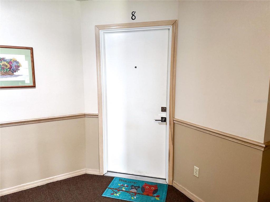 Photo of 5300 White Cliff Lane #8, Orlando, FL 32812 (MLS # O6410292)