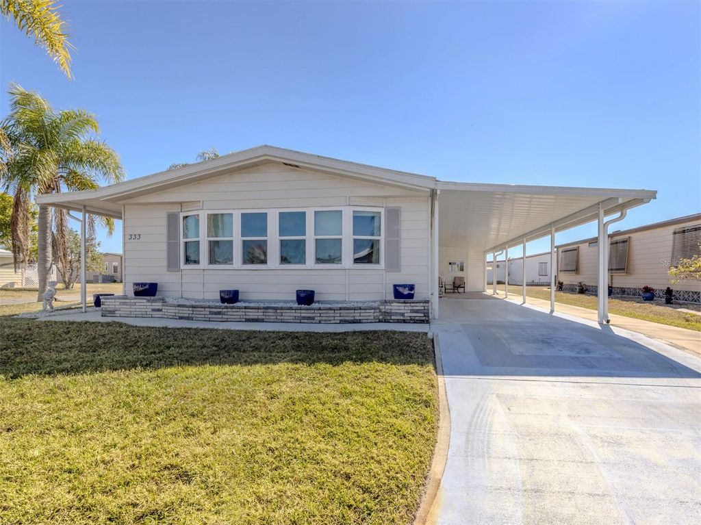 Photo of 333 Outrigger Place, North Port, FL 34287 (MLS # N6142845)