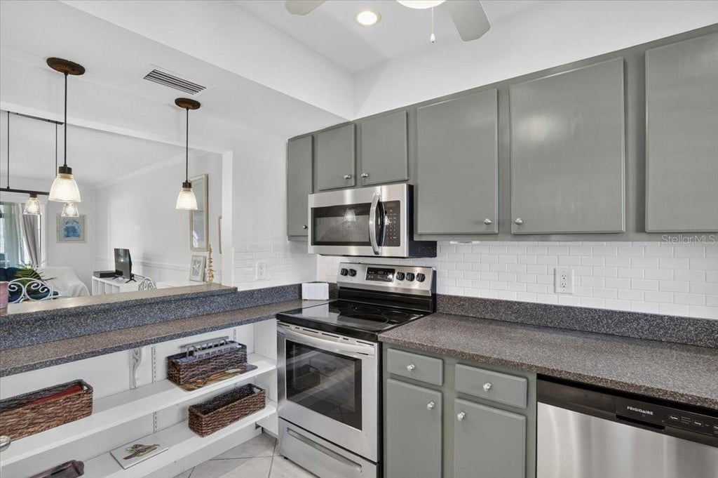 Photo of 1614 Stickney Point Road #1614-1, Sarasota, FL 34231 (MLS # A4708769)