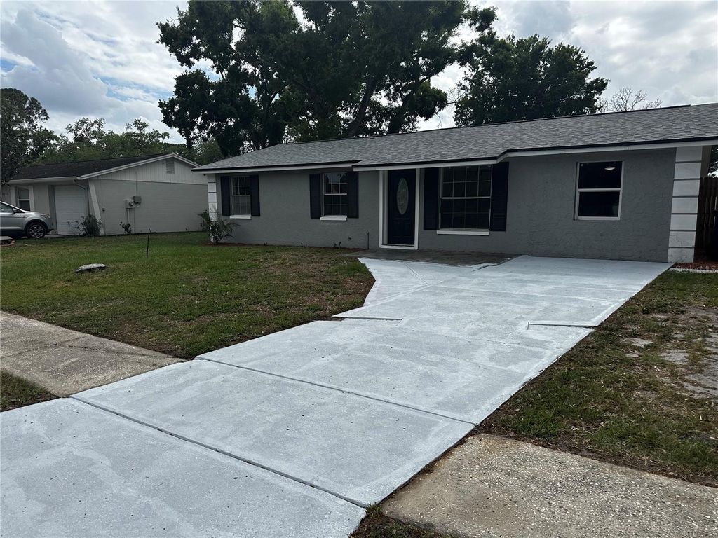 Photo of 3704 Meadowbreeze Drive, Tampa, FL 33619 (MLS # TB8483084)