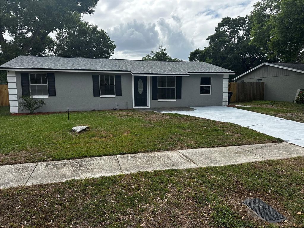Photo of 3704 Meadowbreeze Drive, Tampa, FL 33619 (MLS # TB8483084)