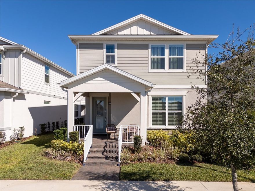 Built in 2023, this beautiful Juniper floor plan is located in the highly desirable, gated resort-style community of Isles of Lake Nona, offering serene water views and an exceptional Lake Nona lifestyle. Ideally positioned just minutes walking distance to Luminary Elementary and Middle school, also from Lake Nona Town Center, Medical City, and the USTA, this two-story home combines modern design, comfort, and convenience.

The welcoming foyer opens to a private first-floor bedroom and full bathroom at the front of the home, showcasing peaceful water views—perfect for guests or a home office. The open-concept layout flows into the upgraded gourmet kitchen, complete with built-in appliances, quartz countertops, a large center island, pantry, and a spacious gathering room ideal for entertaining.
Enjoy a covered lanai and a charming courtyard connecting the home to the rear-entry two-car garage. Recent enhancements include a privacy fence, low-maintenance synthetic grass, and a whole-home water filtration system, creating an inviting and functional outdoor space.

Upstairs, you’ll find a versatile loft, a generous owner’s suite with en-suite bathroom and walk-in closet, two additional bedrooms sharing a full bath, and a conveniently located laundry room. All four bedrooms feature walk-in closets. Designer finishes throughout include white cabinetry, wood-look porcelain tile flooring, pendant lighting, window blinds, and a complete appliance package—including washer and dryer. The home is also pre-wired for Smart Home technology.

The HOA provides exceptional value, covering landscaping for individual homes, internet service, gated access, and full use of the community’s resort-style amenities, including a clubhouse, fitness center, pool with splash pad, playgrounds, and basketball, tennis, and pickleball courts. Easy access to SR-417 allows for a quick commute to downtown Orlando, Disney, and Florida’s beaches.

Experience modern living with resort-style comfort—this Lake Nona home is ready to impress.