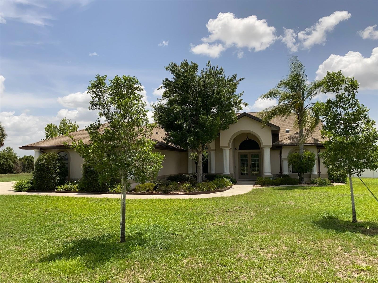 Welcome to this meticulously well maintained and very loved 3/3/2 plus bonus room, pool home that sits on 1.14 acre. Enjoy the functional split floor plan, with carpet and tile flooring throughout. The bright kitchen includes major appliances (Refrigerator, Dishwasher, and Oven/Range), 2 of the guest rooms have Murphy style queen beds, extra insulation in the walls which is great for the light sleepers. There are so many features the owners have thought of, please see the attached list. This home is located in Golf Park. Close to fantastic schools, restaurants and shopping. The AC 2018, Irrigation well pump 2025, Hot water heater 2019