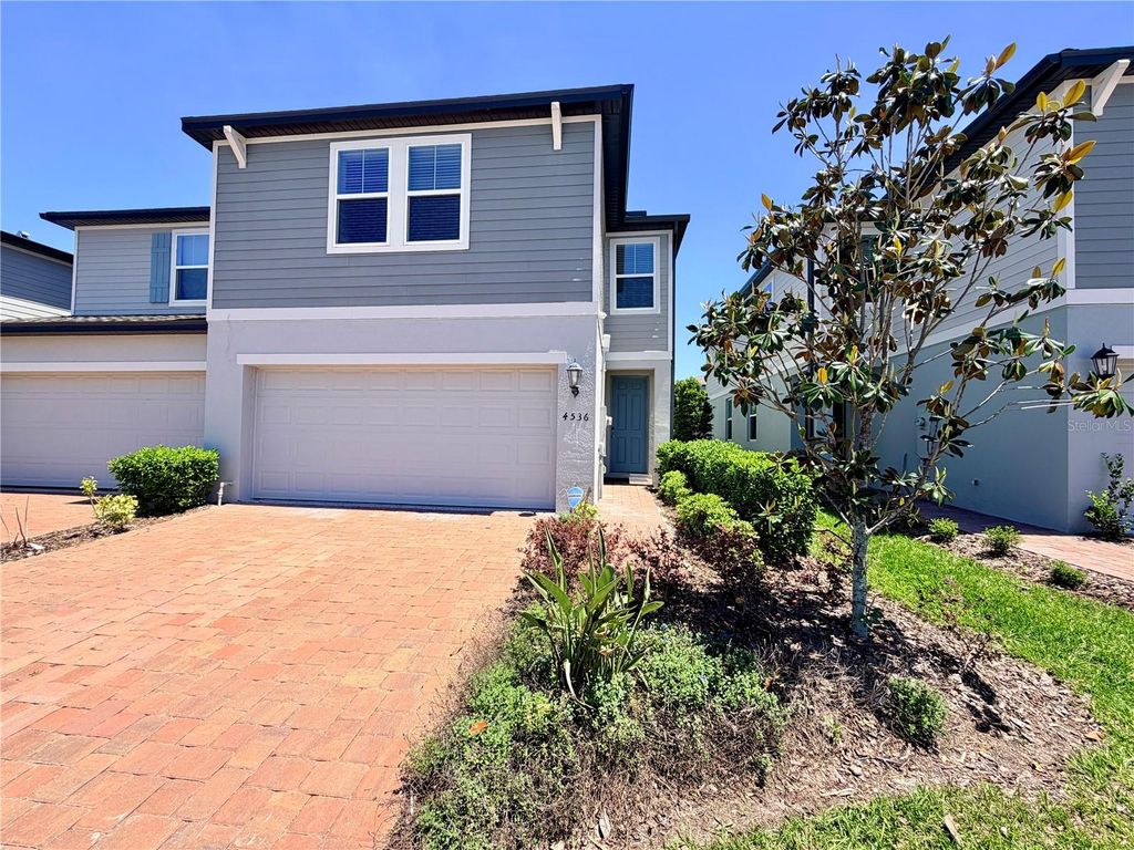 Photo of 4536 Burrowing Owl Loop, Saint Cloud, FL 34772 (MLS # O6396652)