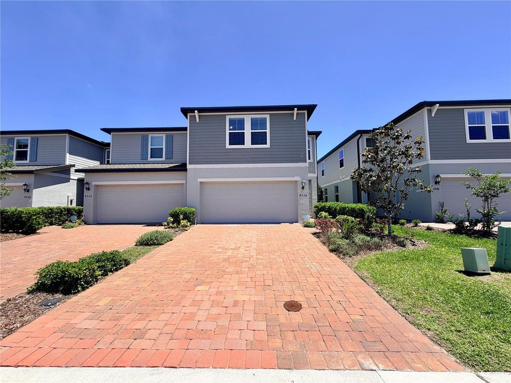 Photo of 4536 Burrowing Owl Loop, Saint Cloud, FL 34772 (MLS # O6396652)
