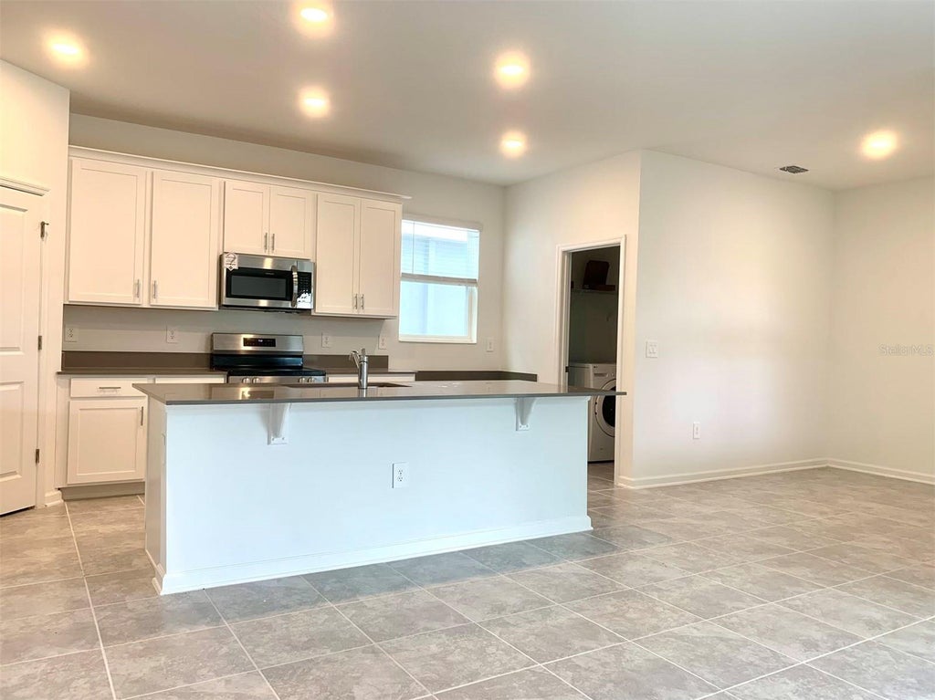Photo of 6283 Blissful Street, Clermont, FL 34714 (MLS # O6438631)