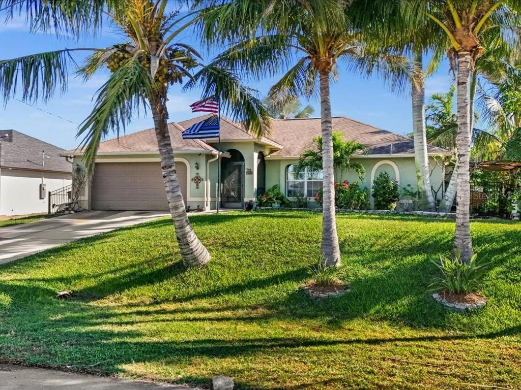 Photo of 1209 NW 25th Place, Cape Coral, FL 33993 (MLS # C7520162)