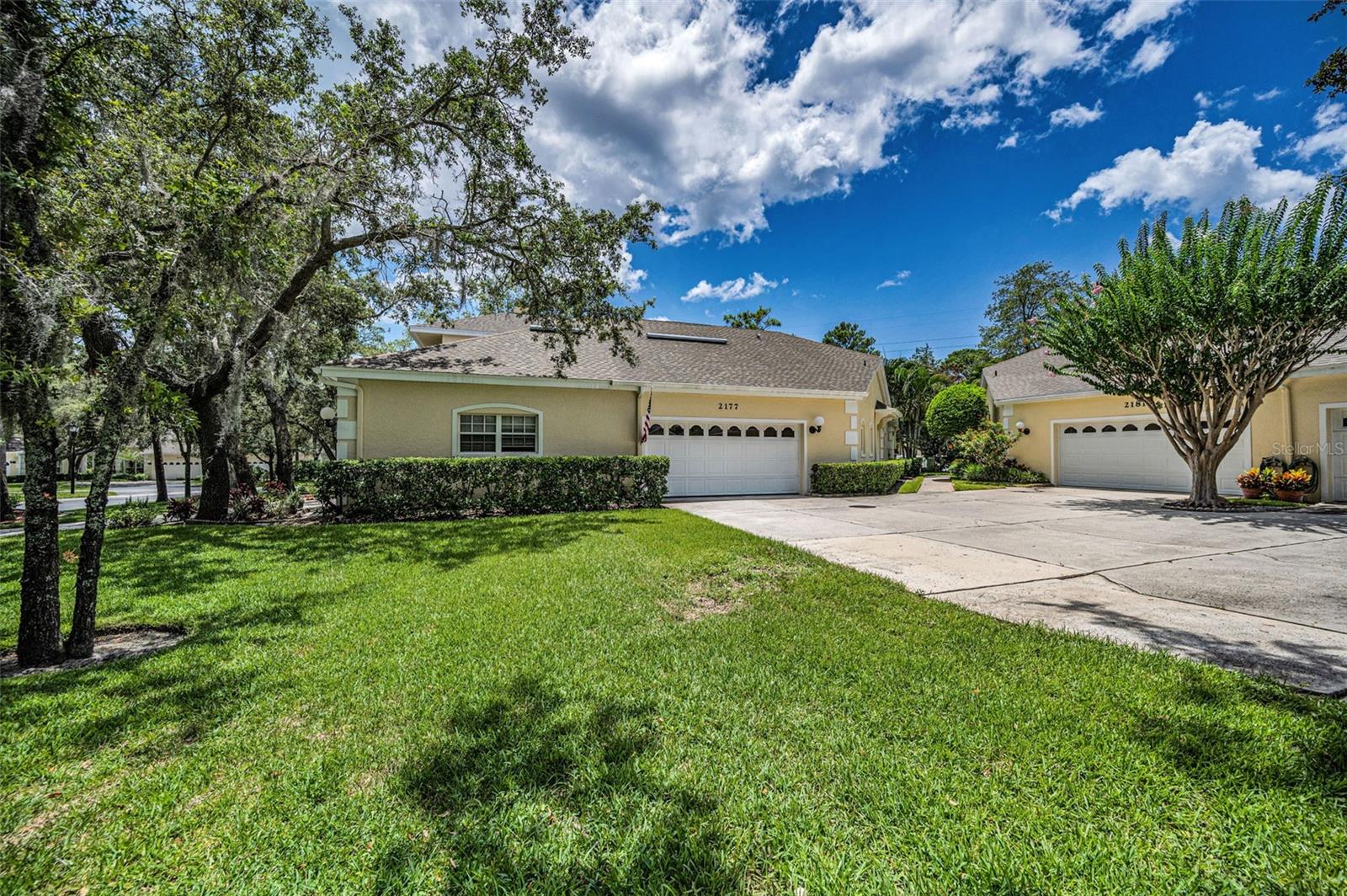 Come visit this MOVE-IN-READY 2BR/2Bathroom/Flex Room with New Murphy Bed-Desk Combo, Vaulted Ceilings, Bright Villa located in the Highly Sought After Gated Forest Retreat Community in Gleneagles, bordering the famous Innisbrook Golf Resort Optional various memberships are available. Enter this home into a Large Dining/Living Room. Next is the spacious Kitchen with new Quartz Countertops and Backsplash, new Stainless Steel sink, insinkerator & faucet, Large new Sit Down Quartz Countertop Island, lots of cabinets and shelved Pantry. New Induction Cooktop Range, Microwave, Dishwasher & newer
Refrigerator. Primary BR has Double Wall & Walk in Closets with built ins. En suite Bathroom has new large design step in tile Shower & 2 separate Vanities with Marble Counters. 2nd Bathroom Has Full Tub/Shower with Marble top Vanity. 2nd Bedroom has Wall Closet with Built ins. Inside Laundry Room has a Sink, cabinets and LG Washer/Dryer (2024). Now come see the 300+SF Family Room (not listed on Property Tax Rolls) with Wet bar spacious cabinets, under-counter Refrigerator & electric Fireplace. Garage has Door Opener (2022) New Attic stairs leading to a large stand up storage area. All rooms have Ceiling Fans except Laundry Room & Kitchen. All Windows have Plantation Shutters. Primary BR, Flex Room, LR & Kitchen have Hurricane rated windows. Family Room and BR#2 have Double Pane Windows. Exterior of Unit was painted in 2024. The Palm Harbor area is known for excellent schools, great dining, close by world renowned Beaches and Tampa International Airport. Pre-Approved, Qualified Buyers Come See Your New Home. Some Furnishings Available for Purchase. EV Charger & Transfer Switch Do Not Convey.