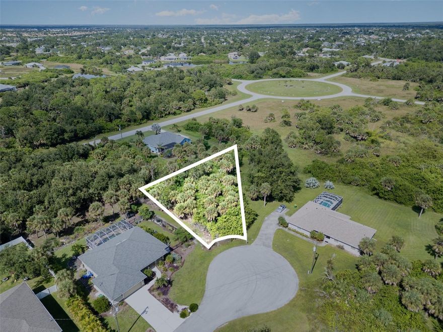 Build your Florida dream home on this oversized lot tucked away at the end of a peaceful cul-de-sac in Rotonda Heights, one of the desirable neighborhoods within Rotonda West. Enjoy a little extra space and privacy with minimal traffic, while still being part of a well-maintained community surrounded by natural beauty. Located within the Rotonda Heights Conservation Association, this homesite offers beautifully kept common areas and low annual fees — perfect for those seeking a relaxed, worry-free lifestyle. Design your ideal home with room for a pool, outdoor living, and lush landscaping. Public water, sewer, and electric are available, making it easy to start your build. Residents of Rotonda Heights enjoy nearby parks, golf courses, and walking trails, plus quick access to Gulf beaches, marinas, and the charming coastal towns of Englewood and Boca Grande for shopping, dining, and year-round recreation. Whether you’re ready to build now or planning for the future, this oversized cul-de-sac lot offers the perfect blend of privacy, convenience, and Florida lifestyle.