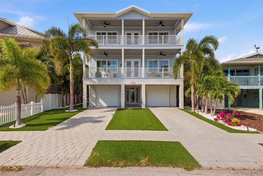 Experience elevated coastal living in this stunning 3-story beach home located in one of Tampa Bay’s most sought-after waterfront communities of Pass a grille. This beach home is located near the iconic Don Cesar and seconds to the beautiful Gulf. This beautifully designed residence features 4 spacious bedrooms, 4 full bathrooms, and 1 half bath, offering the perfect blend of luxury, comfort, and functionality. Boasting a 3-car garage, this exceptional home is ideal for both full-time living and vacation-style entertaining. The open-concept floor plan is filled with natural light, showcasing expansive living spaces, designer finishes, and multiple levels of refined indoor-outdoor living. The home features an elevator to access all three floors and front and back porch patios to watch sunsets. Step outside to your private tropical oasis featuring a saltwater pool and spa, outdoor porch, turf and lush landscaping with a personal putting green, perfect for relaxing after a day at the beach or entertaining guests year-round. Complete with durable Pompeii Quartz and Thermador Appliances. The primary suite resides on the 3rd level covering the entire front of the home, capturing the gulf/water views. 4 spacious covered balconies ensure comfortable indoor/outdoor living. CaliBamboo Engineered hardwood floors throughout home, that have a limestone composite foundation, giving them more of a water/scratch resistance, so you can enjoy the fun beach living with low maintenance floors. The elevator to all 3 levels is centered in a wrap around “Stair Tower”. Laundry/pantry rooms are on both the 2nd and 3rd levels. Every ensuite bedroom has it’s own bathroom, walk-in closet with custom shelving, and balcony access. Quick access to I-275 that will take you to Downtown St Pete in less than 10 minutes or Tampa International Airport in 30 minutes.This home also features a 16,000 lb boat lift and private boat dock. Enjoy the ultimate Florida lifestyle with generous outdoor space, elevated balconies, and close proximity to the Gulf beaches, dining, and shopping. Whether you’re seeking a luxury primary residence or an incredible coastal retreat, this one-of-a-kind property delivers sophistication, space, and resort-style amenities in an unbeatable location.