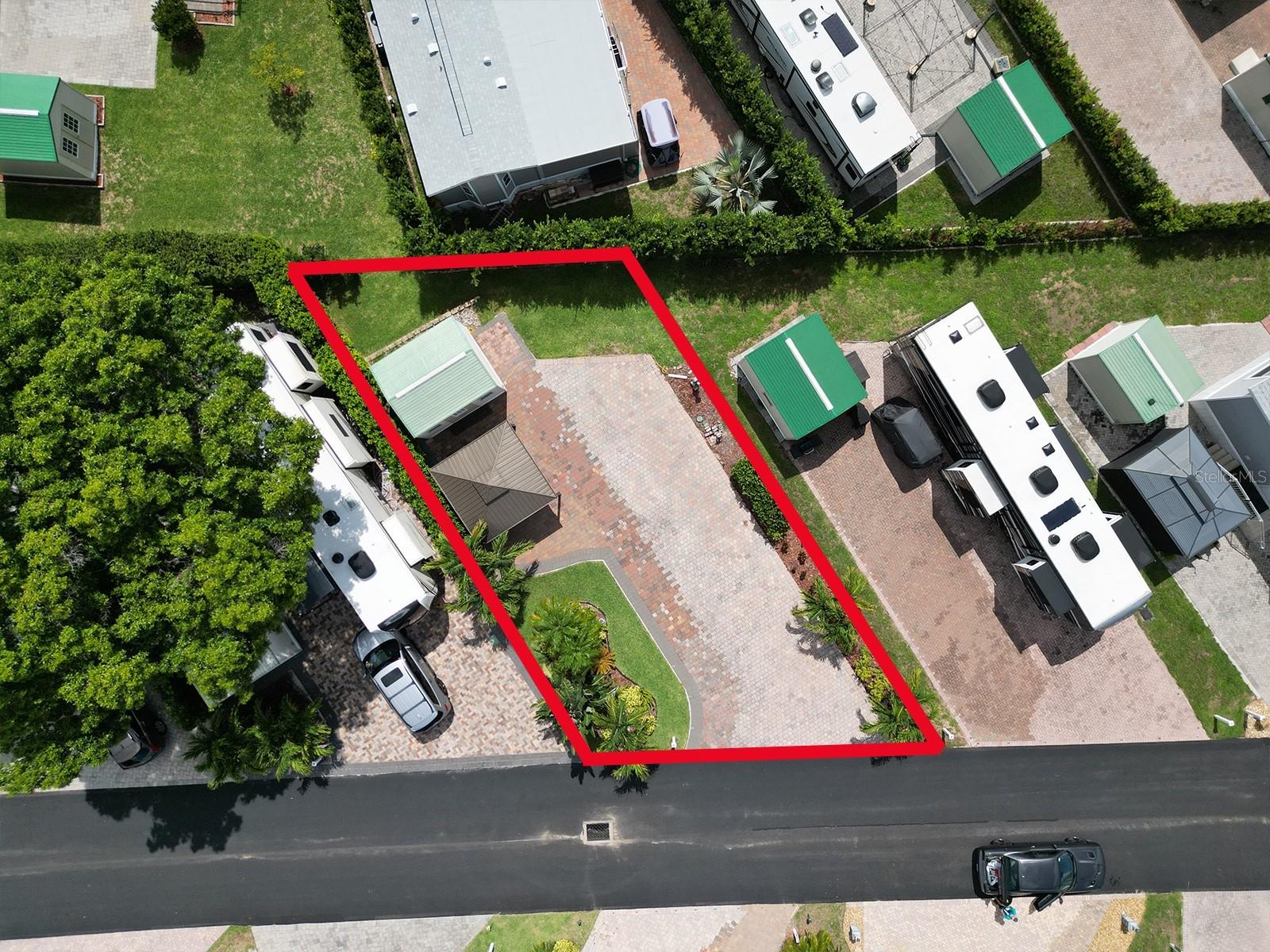 Welcome to Elite Resorts at Citrus Valley where you can own your own piece of paradise. This lot is one of the largest lots on the block, perfectly manicured, includes irrigation, landscape lighting, a shed with electricity, steps for your RV, a covered lanai and perfectly maintained pavers with level ground for your RV or park model trailer. This lot just a short walk away form all of the amenities this resort includes such as a resort style pool, playground, clubhouse, laundry facilities and so much more! You are less than 20 minutes away from Disney and Universal, close to state parks, the Clermont chain of lakes, outdoor activities, world class golf courses and more! Don’t miss this opportunity to own a piece of paradise!