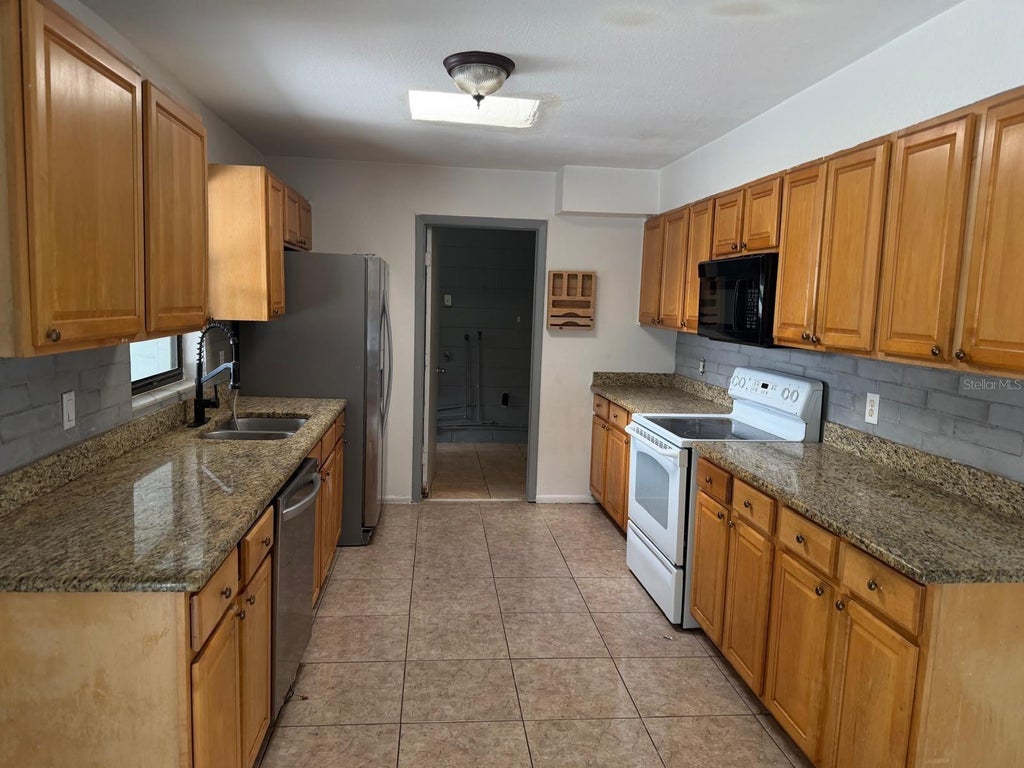 Photo of 42 Wagon Circle, Kissimmee, FL 34743 (MLS # TB8560966)