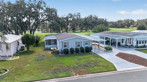 Tiny photo for 718 Orchid Street, Lady Lake, FL 32159 (MLS # G5119205)