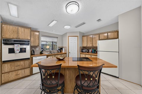 Tiny photo for 718 Orchid Street, Lady Lake, FL 32159 (MLS # G5119205)
