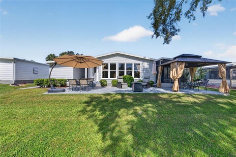 Tiny photo for 718 Orchid Street, Lady Lake, FL 32159 (MLS # G5119205)