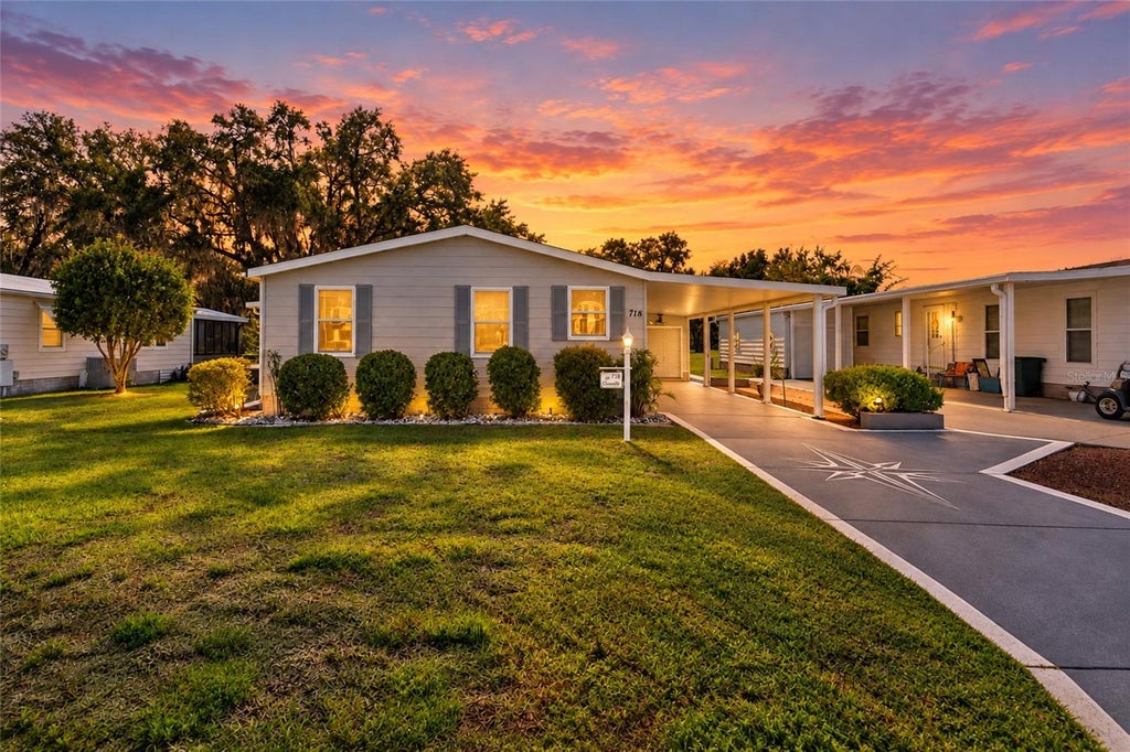Photo of 718 Orchid Street, Lady Lake, FL 32159 (MLS # G5119205)