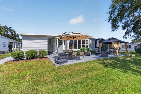 Tiny photo for 718 Orchid Street, Lady Lake, FL 32159 (MLS # G5119205)