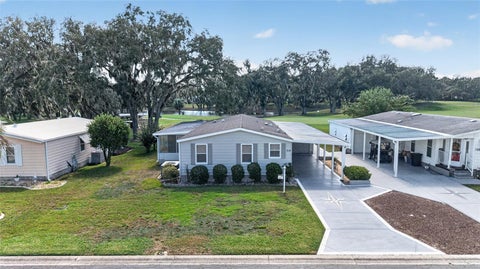 Tiny photo for 718 Orchid Street, Lady Lake, FL 32159 (MLS # G5119205)