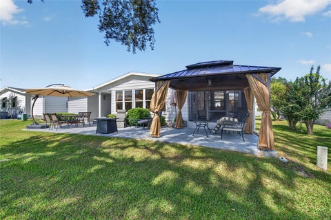 Tiny photo for 718 Orchid Street, Lady Lake, FL 32159 (MLS # G5119205)