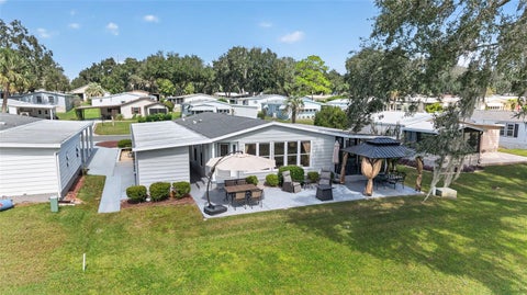 Tiny photo for 718 Orchid Street, Lady Lake, FL 32159 (MLS # G5119205)
