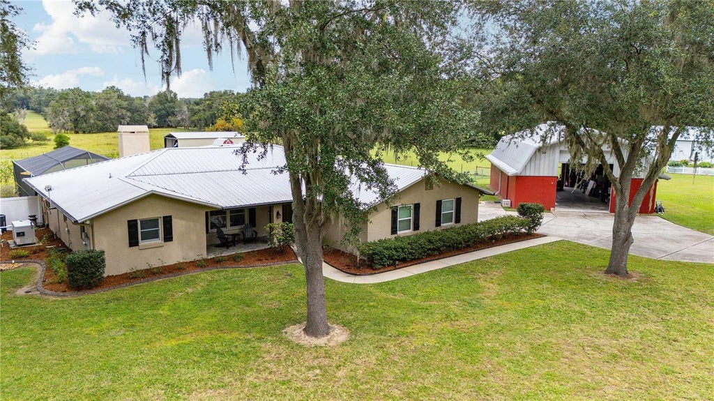 Photo of 16450 Spring Valley Road, Dade City, FL 33523 (MLS # TB8553159)