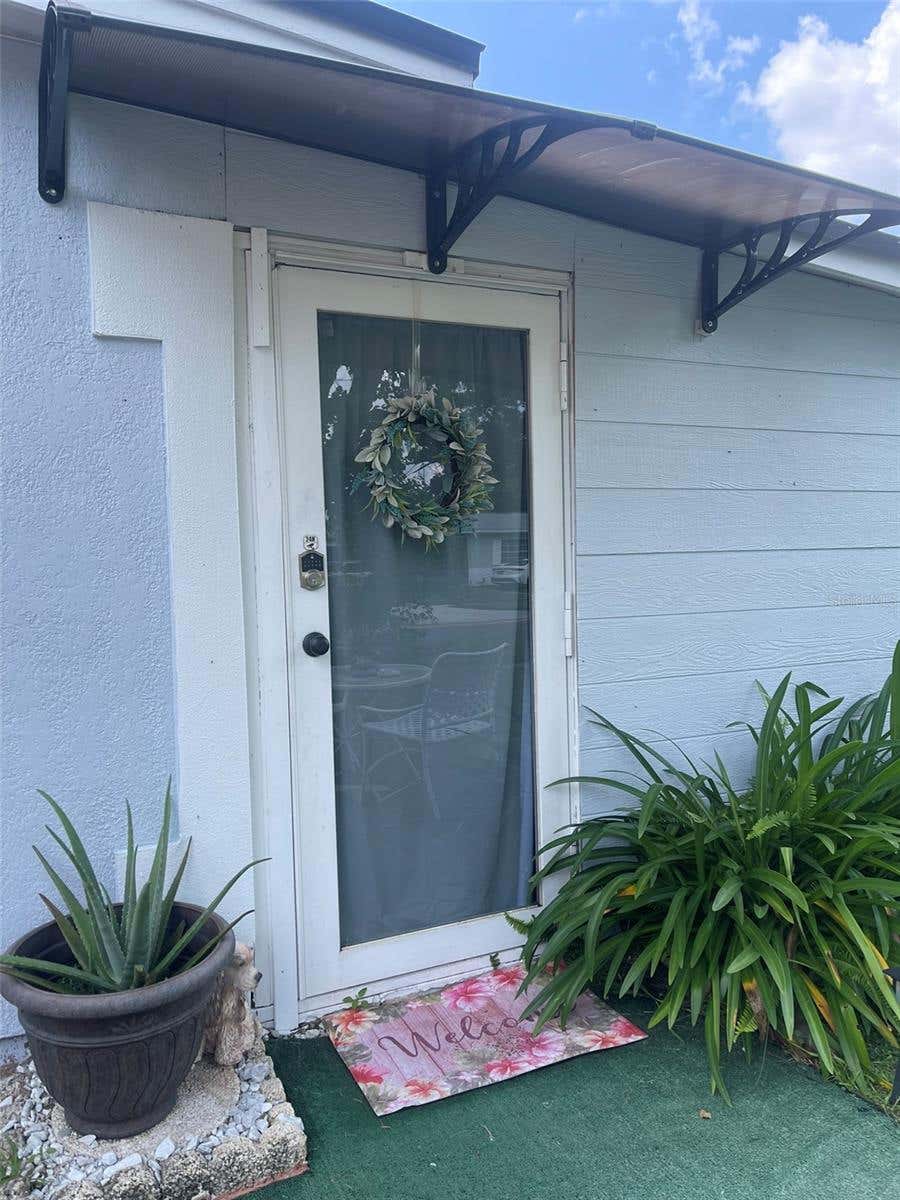Photo of 7410 Autumnvale Drive #B, Orlando, FL 32822 (MLS # O6435138)
