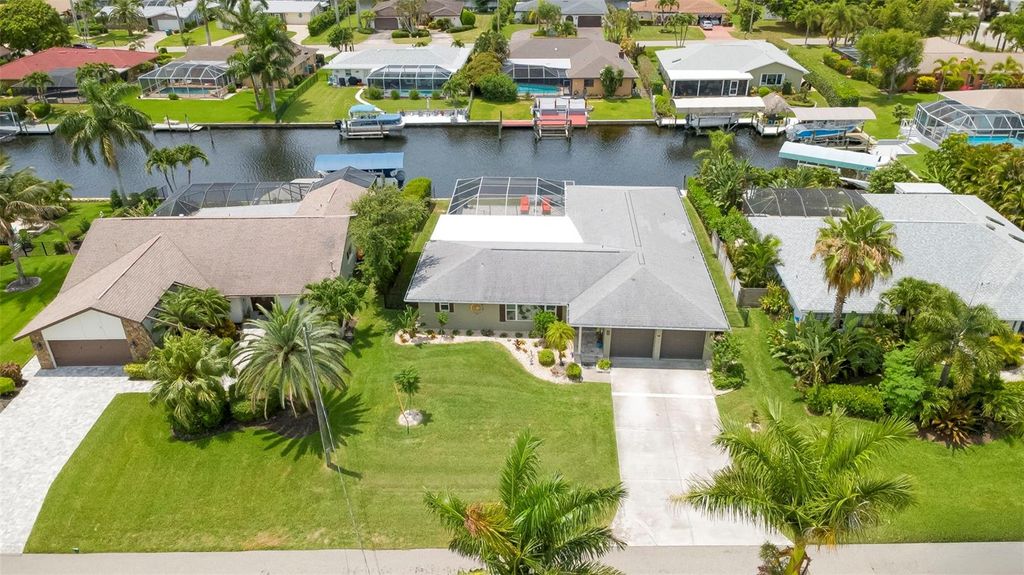 Photo of 1820 SE 36th Terrace, Cape Coral, FL 33904 (MLS # O6416431)