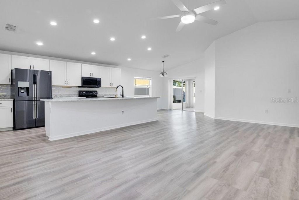 Photo of 693 Persian Drive, Haines City, FL 33844 (MLS # S5143441)