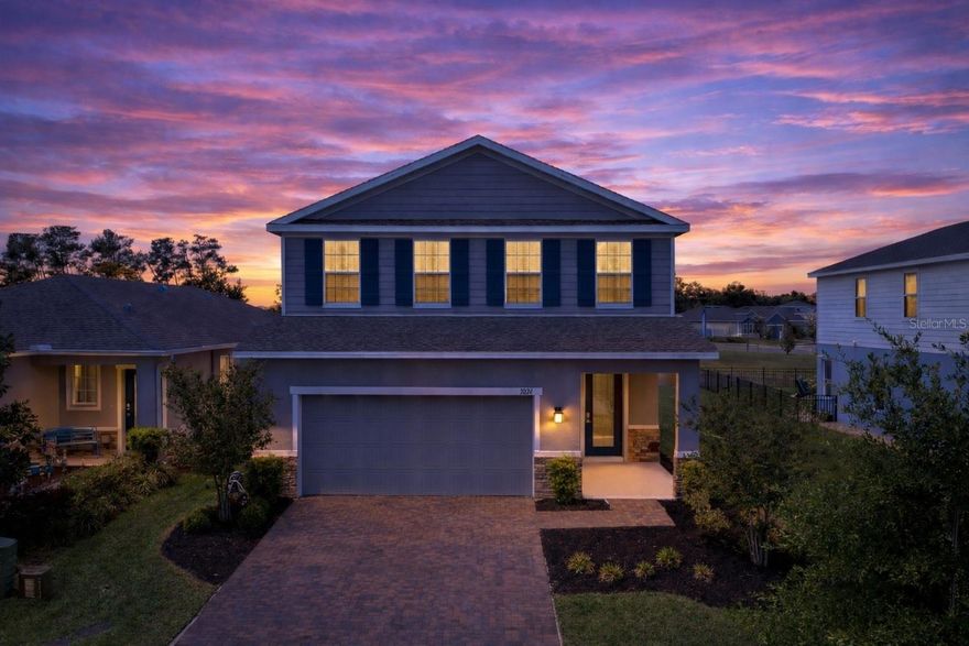 One or more photo(s) has been virtually staged. Welcome to 7024 Lanier Falls in DeLand! This move-in ready 5-bedroom/3-bathroom two-story home offers over 2300 sqft of living space with a highly desirable open-concept floor plan that's perfect for both everyday living and entertaining.

The spacious kitchen features stainless steel appliances, a large island, walk-in pantry and overlooks the main living area, creating a seamless flow for gatherings. Upstairs, you’ll find generously sized bedrooms along with a versatile bonus room.  An ideal space for a home office, media room, or playroom.

Enjoy Florida living in your fully fenced backyard with peaceful water views, providing both privacy and a relaxing setting. There is plenty of room to add a pool, giving you the opportunity to design your own private outdoor oasis. Additional highlights include a paver driveway, covered patio, and great curb appeal with well-maintained landscaping.

Located in a desirable DeLand community with convenient access to shopping, dining, and historic downtown DeLand. Easy commute to Orlando, beaches, and major highways.

Don’t miss this opportunity to own a well-maintained home with space, flexibility, and outdoor potential.  Schedule your private showing today!