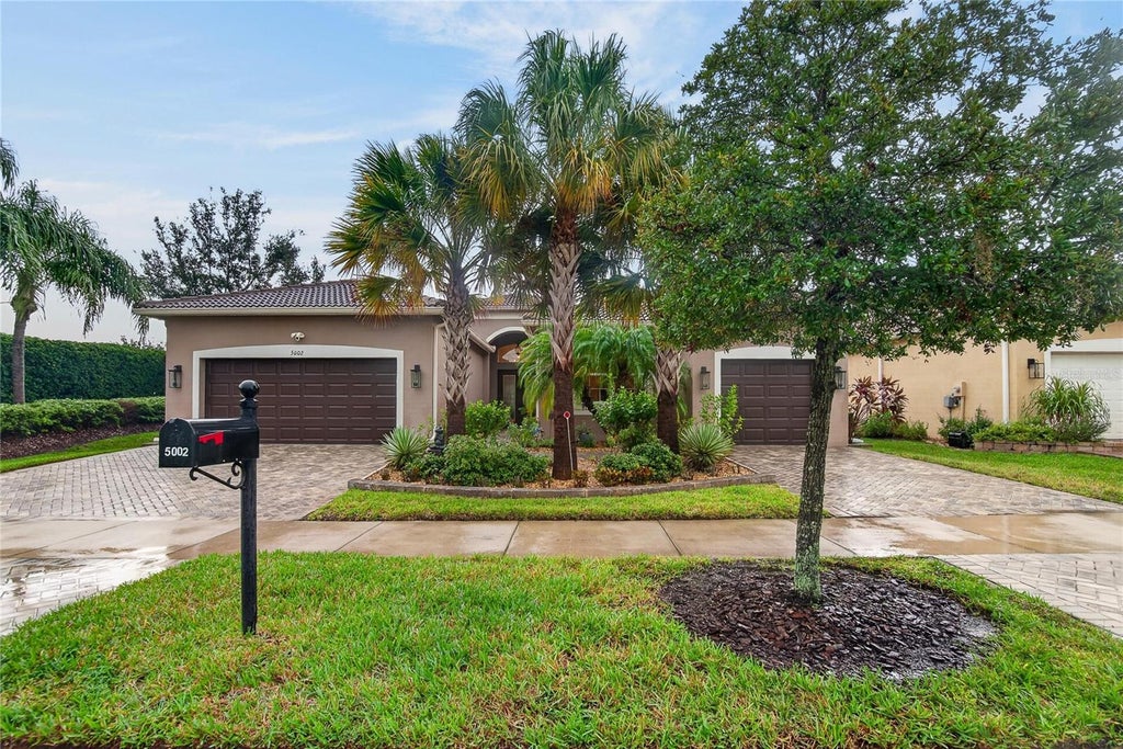 Photo of 5002 Emerald Isle Drive, Wimauma, FL 33598 (MLS # TB8554800)