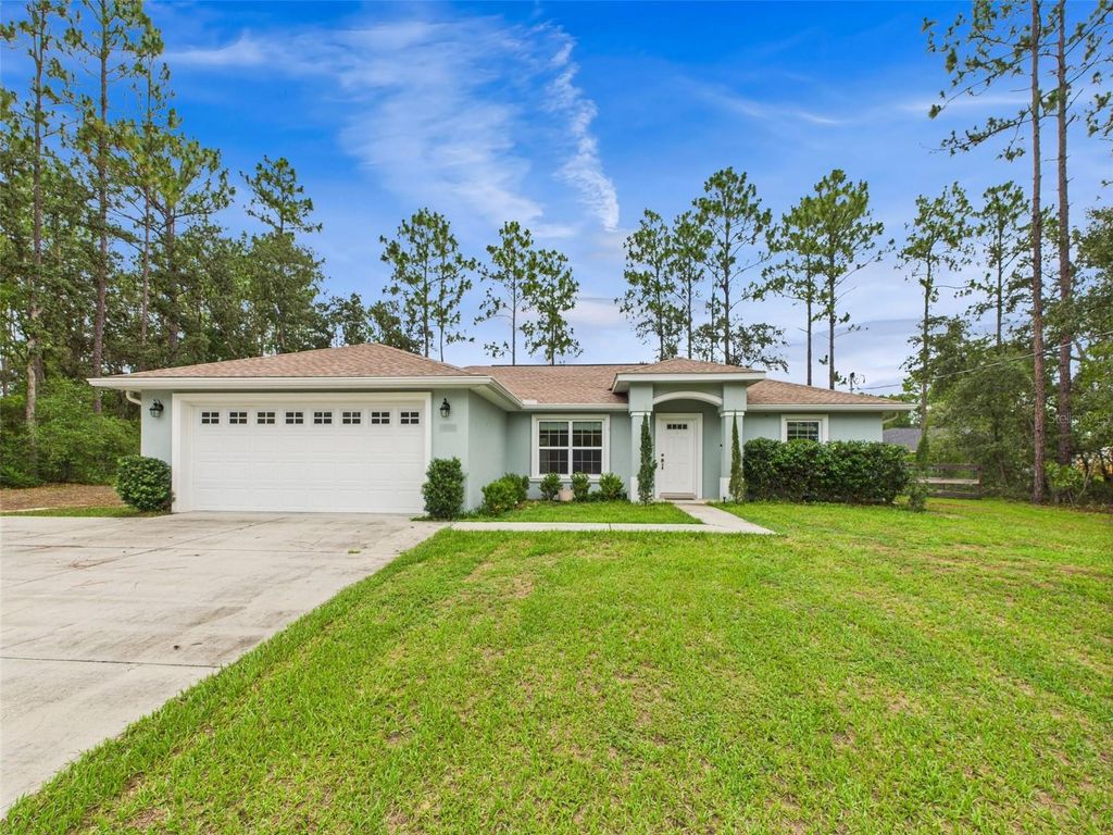 Photo of 1899 W Oliver Drive, Citrus Springs, FL 34434 (MLS # OM705027)