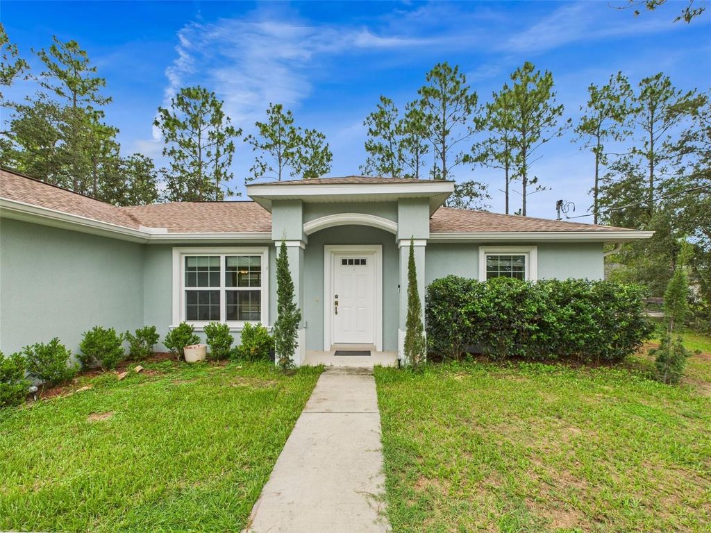 Photo of 1899 W Oliver Drive, Citrus Springs, FL 34434 (MLS # OM705027)