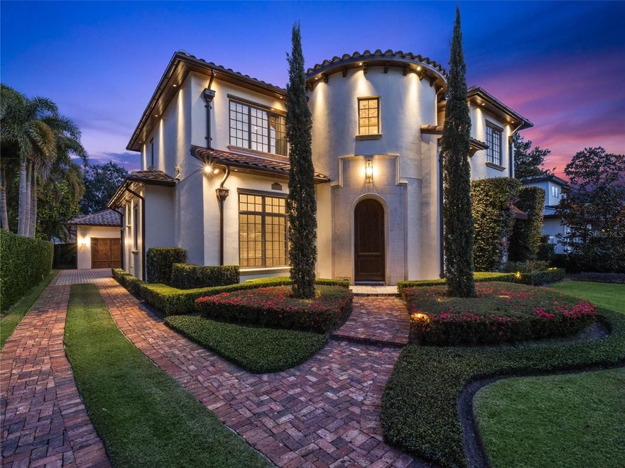 Welcome to an exquisite custom-built Mediterranean oasis nestled on a tranquil brick street in the heart of Winter Park. Recently updated and only one mile from Park Avenue's vibrant shops and restaurants, this home offers 4,240 square feet of luxurious living space, featuring 4 bedrooms, 5 full baths, and two half baths. Crafted in 2008 by Arlington Homes, this meticulously designed residence transforms every gathering into an unforgettable event. The expansive screened lanai, complete with a summer kitchen and full pool bath, seamlessly merges indoor and outdoor living, perfect for entertaining guests. The primary suite, located on the first floor, overlooks the serene screened pool/lanai and boasts his and her vanities, a lavish soaking tub, spacious shower, and ample walk-in closets. Indulge in the 145-bottle climate-controlled wine cellar or enjoy the convenience of the laundry room adjacent to the primary closet, featuring abundant storage and dual washer and dryer sets, one on each level. The gourmet kitchen dazzles with custom cabinetry, premium countertops, top-of-the-line appliances, and multiple dishwashers, complemented by refrigerator and freezer drawers. Upstairs, discover three bedroom en-suites, along with a sprawling media/bonus/game room featuring a wet bar and expansive private balcony. Conveniently situated near Baldwin Park, Park Avenue, and downtown Orlando, this residence also offers access to top-rated Winter Park Schools and Lake Highland Preparatory School, mere minutes away. This home epitomizes luxury living and unparalleled convenience, promising a lifestyle of sophistication and serenity in Winter Park's premier locale. Bedroom Closet Type: Walk-in Closet (Primary Bedroom).