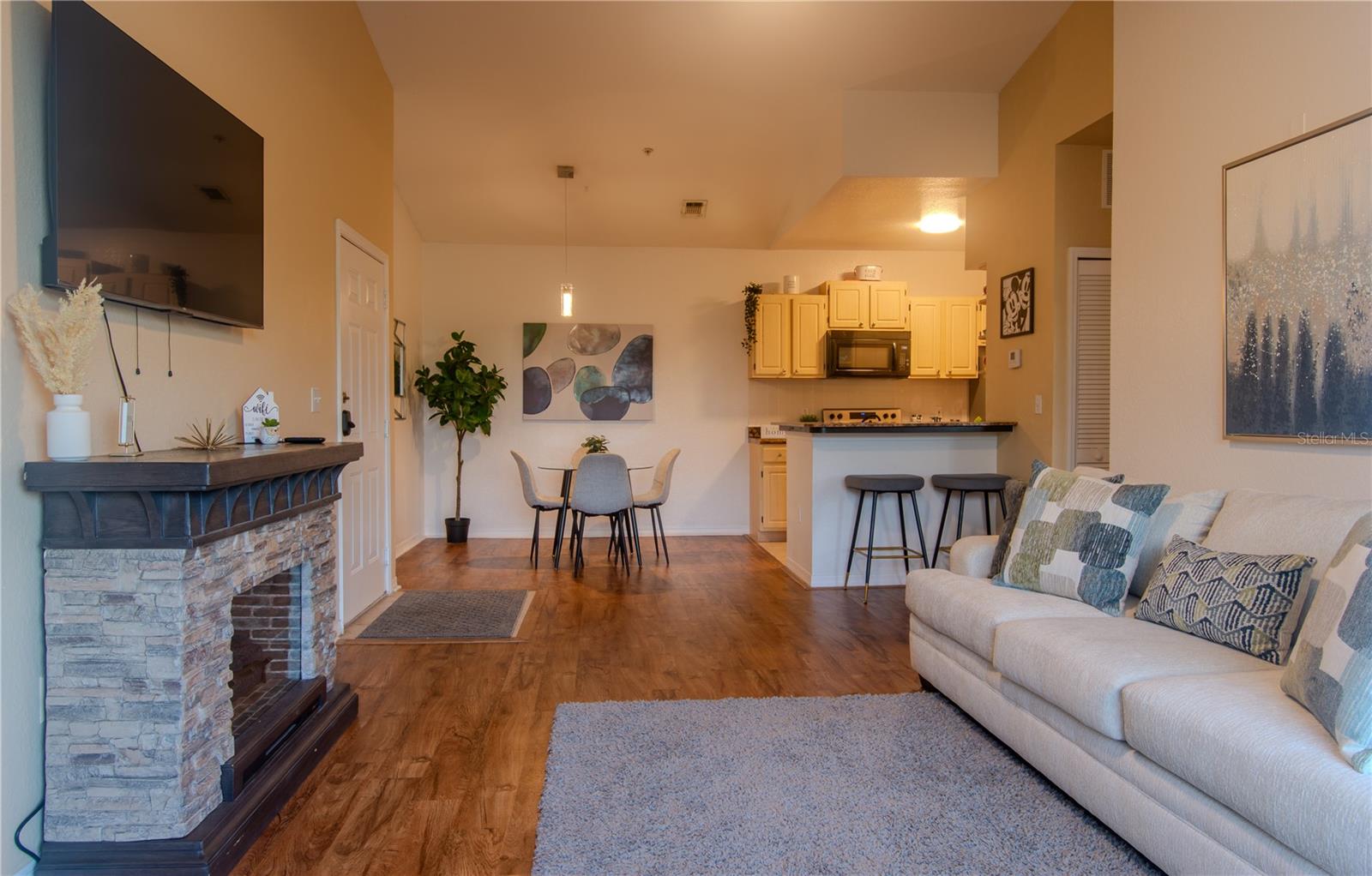 Beautifully updated 1-bedroom, 1-bath condo in the highly desirable, resort-style gated community of Legacy Dunes! This spacious unit features waterproof vinyl plank flooring with a wood-grain finish in the living, dining, and bedroom areas, plus tile in the kitchen and bath. Enjoy a private, screened-in patio with extra storage — perfect for morning coffee or evening relaxation. The energy-efficient A/C (2019) and ceiling fans keep you cool and comfortable year-round.
Legacy Dunes offers the ultimate Florida lifestyle with 50 acres of lush, landscaped grounds, two resort-style pools (one with a splash pad and lagoon entry), a newly upgraded fitness center, tennis, pickleball, basketball, sand volleyball, BBQ areas, golf cage, a large playground, walking trails, lakes, and fountains. The clubhouse includes a game room, conference room, and an enclosed A/C sunroom overlooking the pool.
Located just 6 miles from Disney’s Animal Kingdom and 4 miles from H2O Water Park, and close to endless dining, shopping, and entertainment options. Ideal for a vacation retreat, investment property with short or long-term rental potential, or your own full-time residence in the heart of Central Florida!