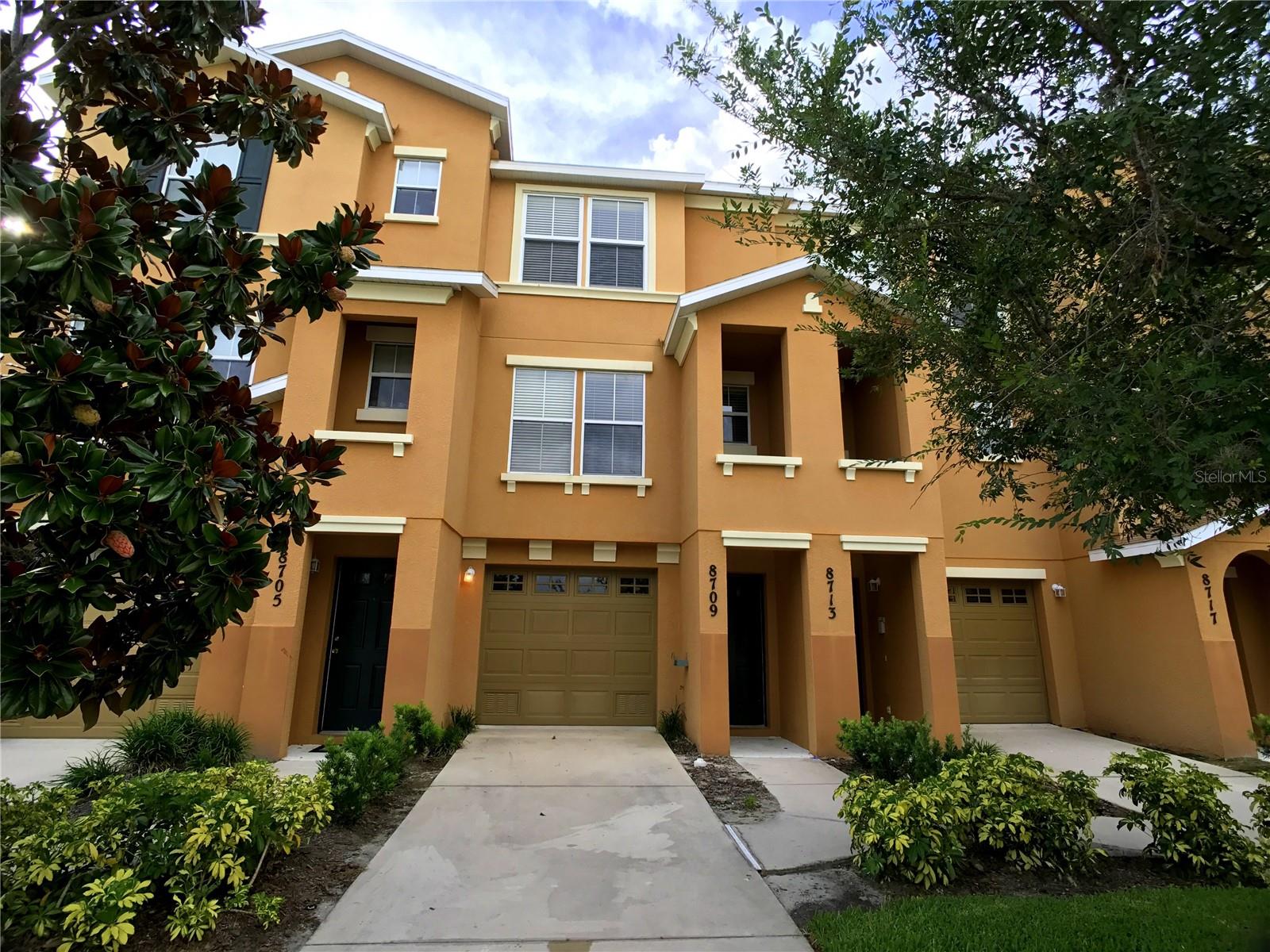 LOCATION - LOCATION - LOCATION --- Do not miss out on this 2 bedroom, 2 1/2 bath, townhouse style condo with an attached 2 car garage (single wide by 2 cars+ deep) - both bedrooms, on the 3rd floor, offer private bathrooms and a laundry room in between. Nicely upgraded kitchen appliances, tile floors and granite counter tops. Wood floors throughout remainder of home. Rear of Property has 3 outside decks/porches, looking to a private green space. First floor, off garage, is a covered porch. 2nd floor, off the dining room, is a screened/covered porch and there is an open balcony off one of the master bedrooms on 3rd floor. Willowbrook is a beautiful gated neighborhood with a community pool. Located close to all Lakewood Ranch has to offer including abundant shopping, dining and entertainment. I-75 access, the UTC Mall and Nathan Benderson Recreational lake is just a short distance away. Water, Trash and Cable/WiFi included with rent.
