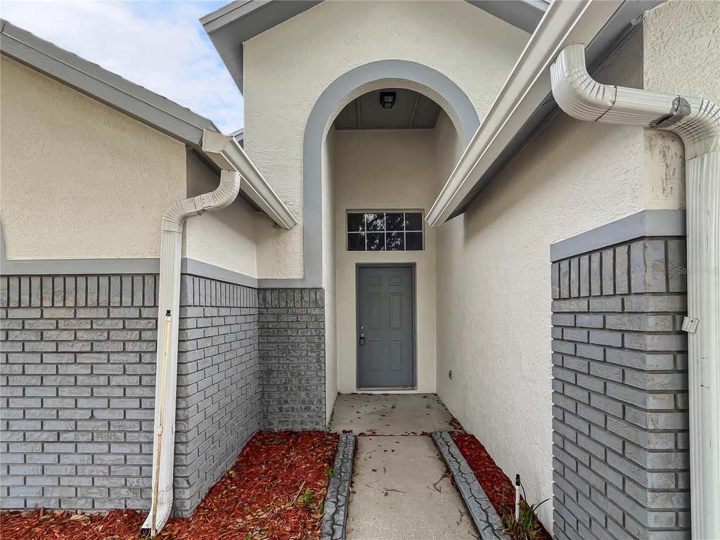 Photo of 1537 Maximilian Drive, Wesley Chapel, FL 33543 (MLS # O6414409)