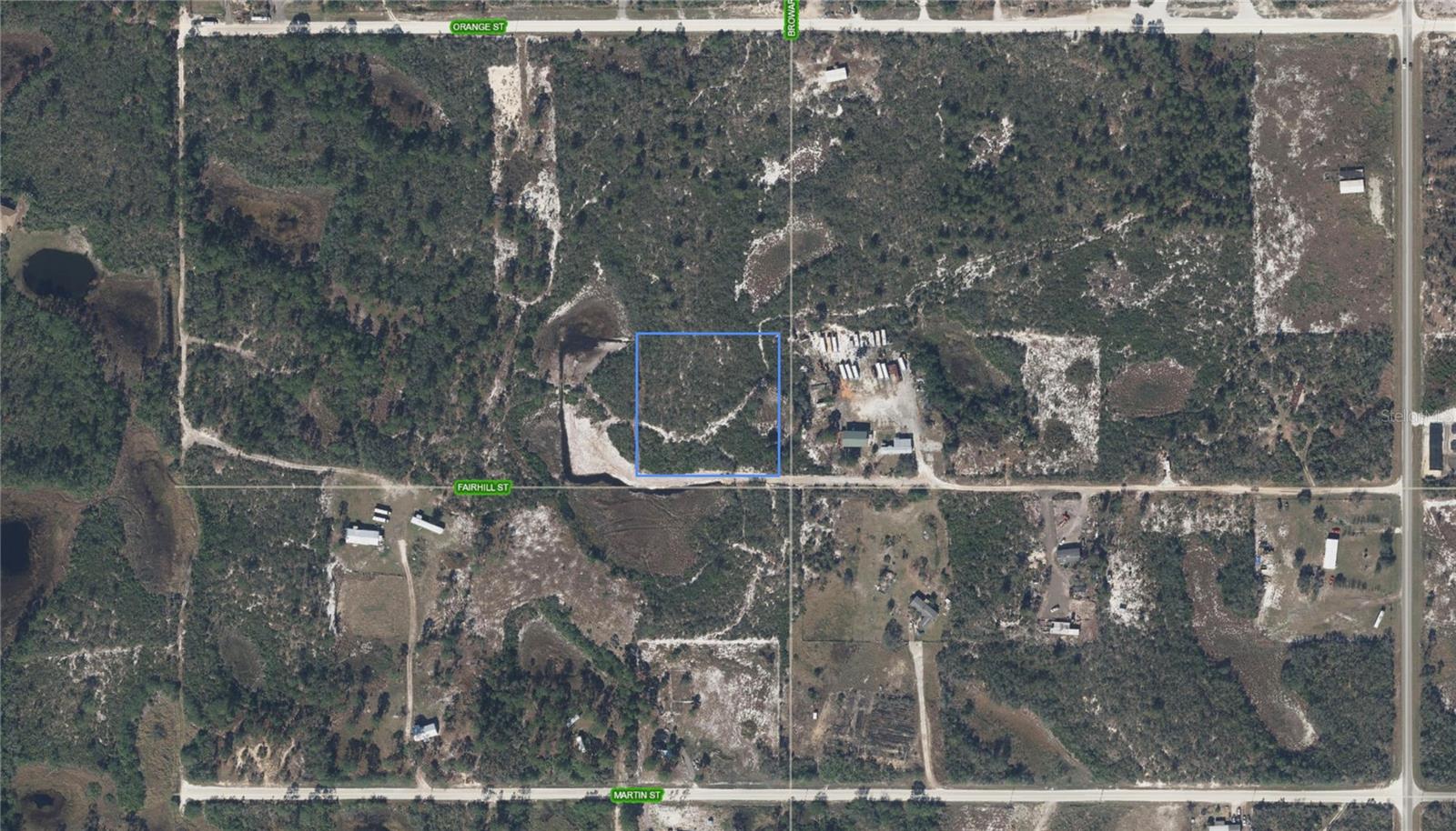 MOBILE HOMES OK! Good dry lot. Need FINANCING? It may be available for well qualified buyers. Ask for details. Just a few lots off of the PAVED road at the end of the street. Priced to sell quickly. No HOA or community fees. Easy electric hookup. Nearby to many lakes and state parks as well as downtown Lake Placid with various restaurants, supermarkets, pharmacies, & stores.