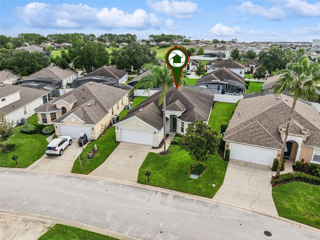 Photo of 172 Plumoso Loop, Davenport, FL 33897 (MLS # O6350352)