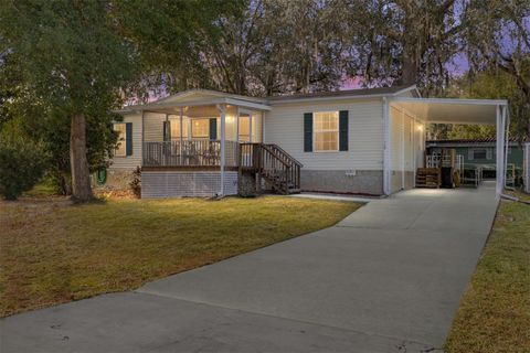 Photo of 320 NE 64th Avenue, Ocala, FL 34470 (MLS # OM713901)