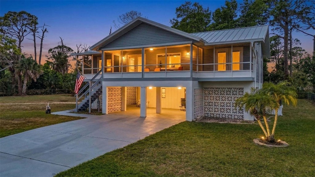 Photo of 3059 Holcomb Road, Port Charlotte, FL 33981 (MLS # C7532216)
