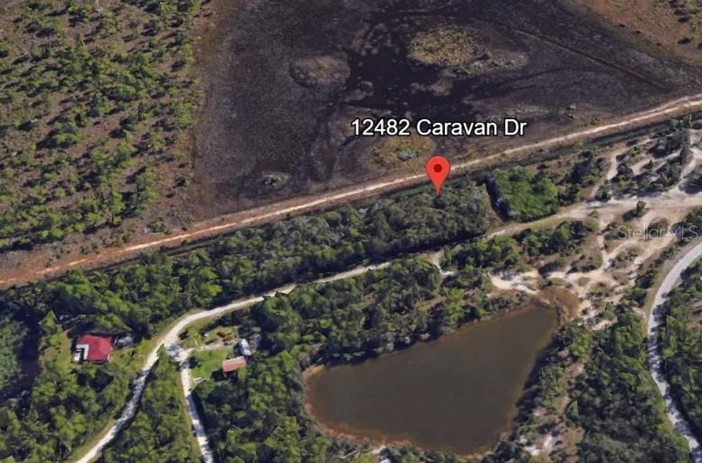 Photo of 12482 Caravan Drive, Punta Gorda, FL 33955 (MLS # A4619194)